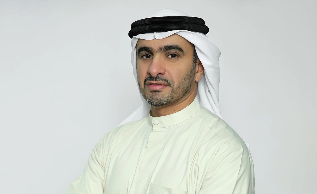 A professional portrait of a National Bonds executive representing the organization's strategic vision for wealth building, financial prosperity, and innovative saving schemes.